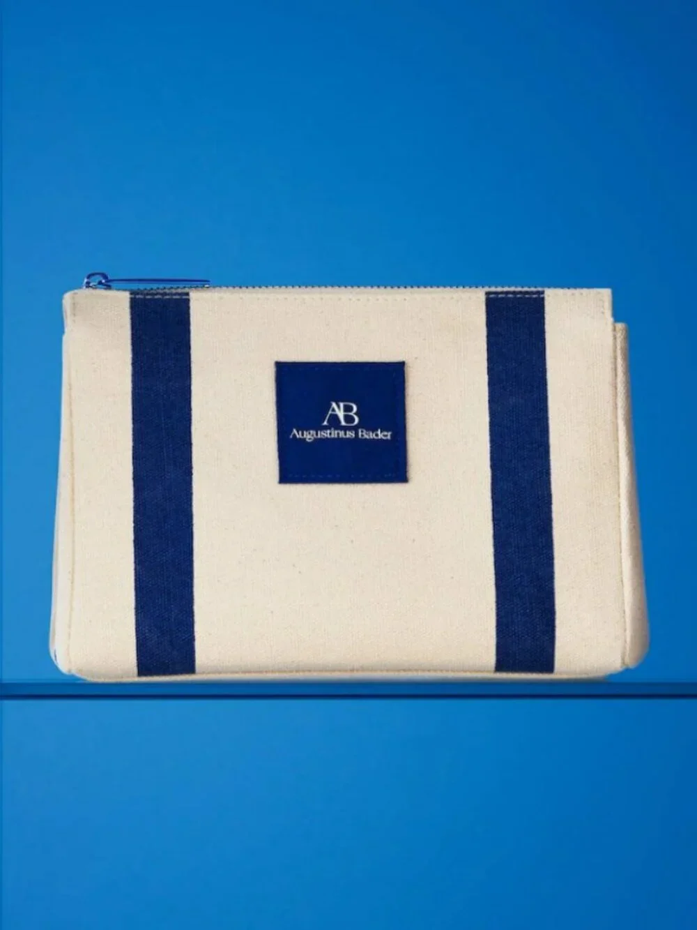 Augustinus Bader cream & blue striped canvas cosmetic bag makeup travel pouch